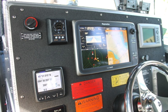 The vessel's control center includes radar, thermal imaging cameras, a Global Positioning System (GPS), and an Automatic Identification System (AIS) used to track marine traffic.